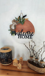Decoración de pared redonda de madera "Bienvenido a casa negro"