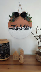 Decoración de pared redonda de madera "Estos somos nosotros"