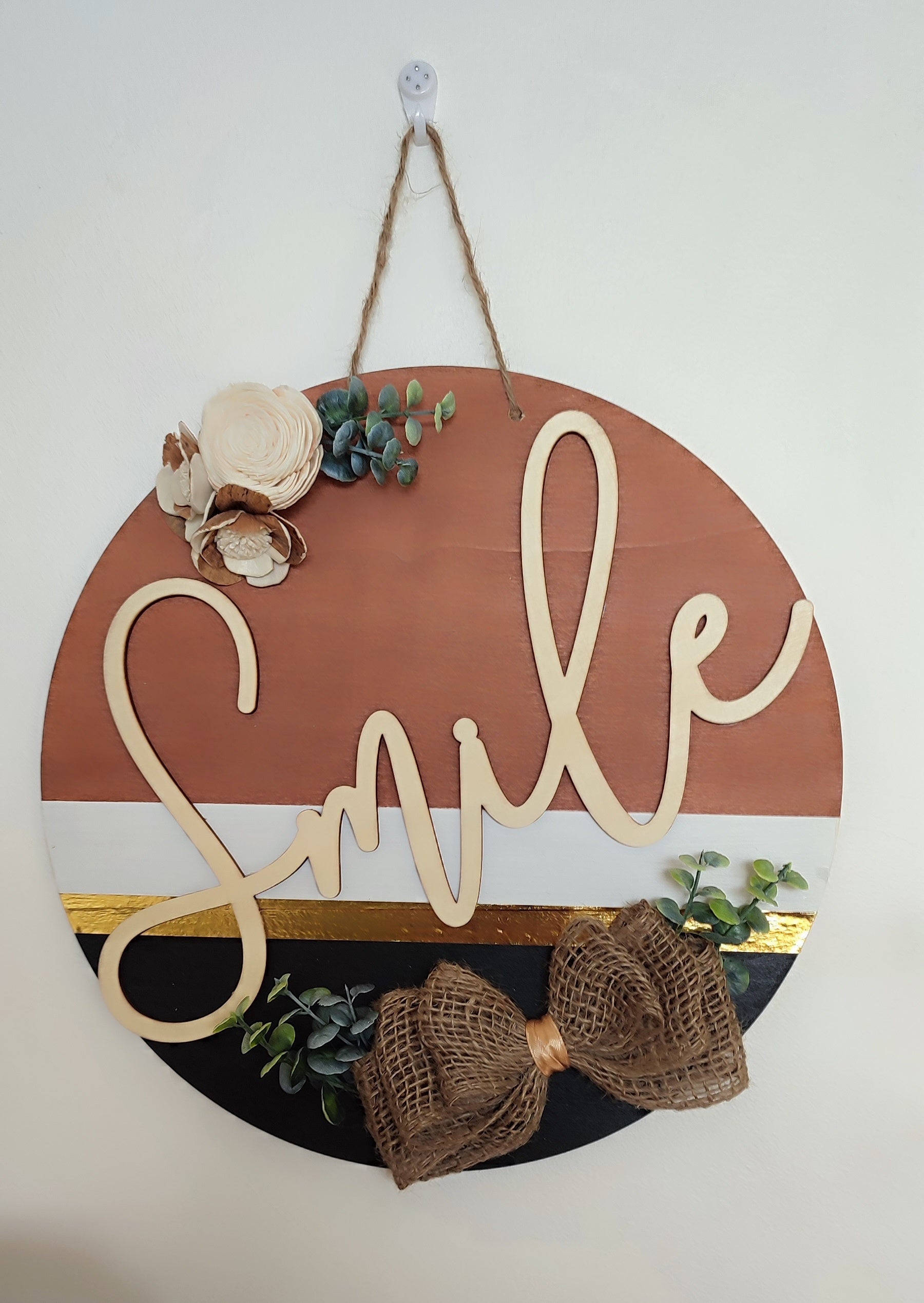 Decoración de pared redonda de madera "Sonrisa"
