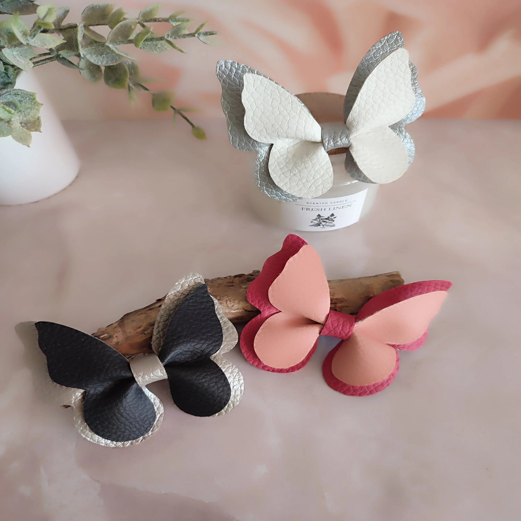 Barrette papillon en simili cuir Nos p'tits Bonheurs